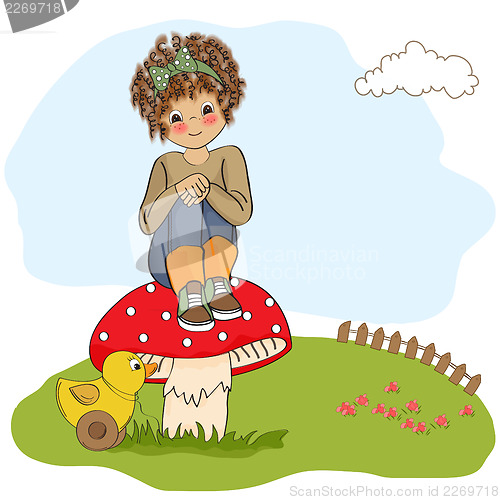 Image of pretty young girl sitting on a mushroom