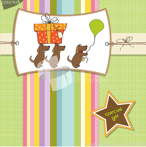 Image of three dogs that offer a big gift. birthday greeting card