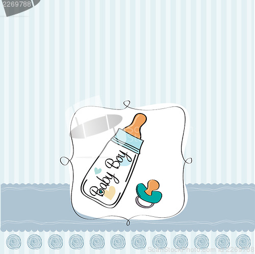 Image of baby announcement card with milk bottle and pacifier