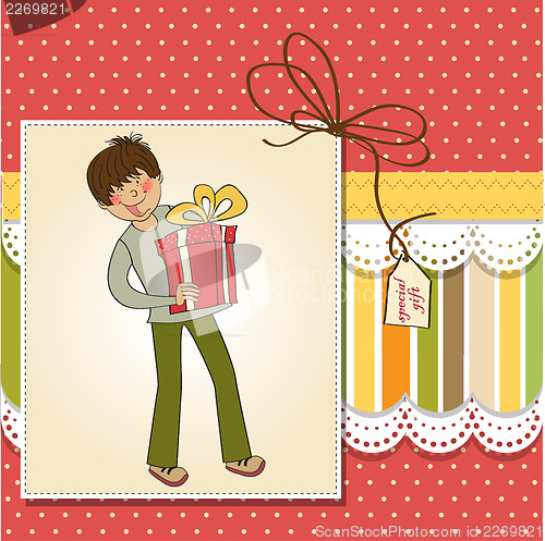 Image of birthday card with boy and big gift box