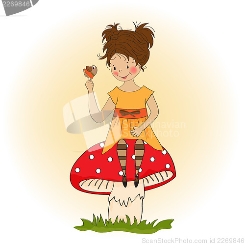 Image of pretty young girl sitting on a mushroom