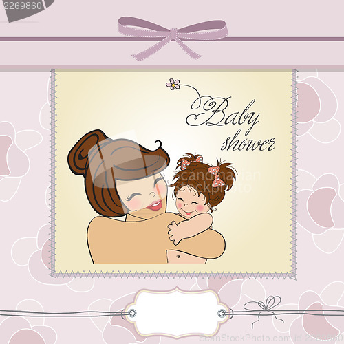 Image of young mother holding a new baby girl