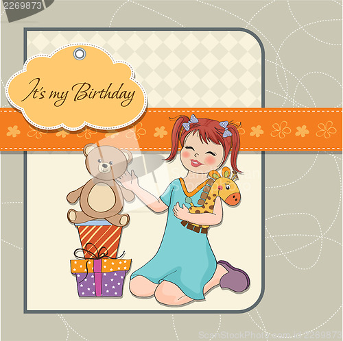 Image of little girl playing with her birthday gifts . happy birthday car