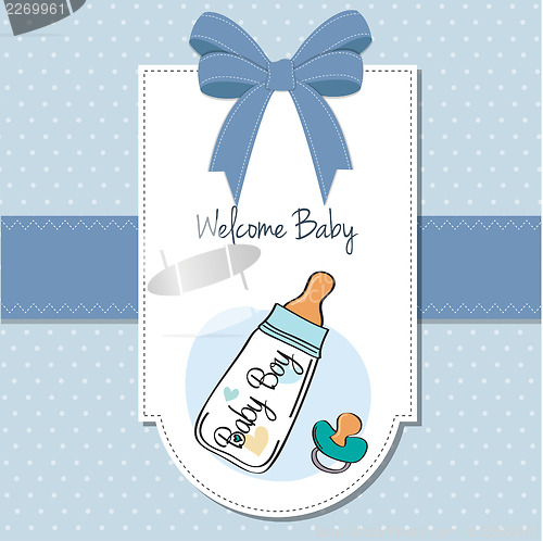 Image of baby announcement card with milk bottle and pacifier