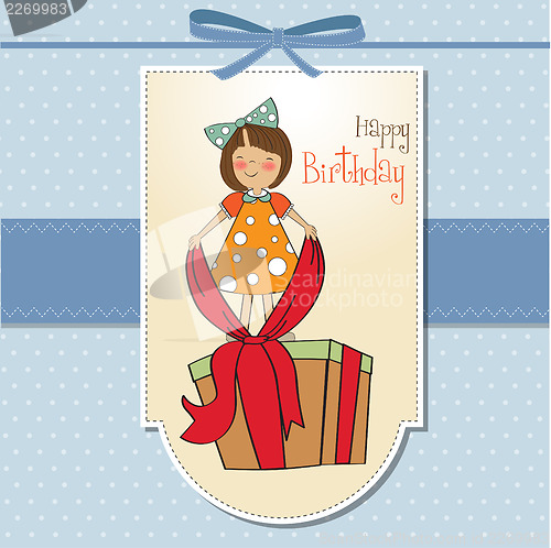 Image of a nice girl with a big gift box