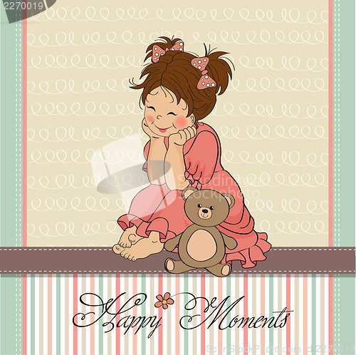 Image of little baby girl play with her teddy bear toy