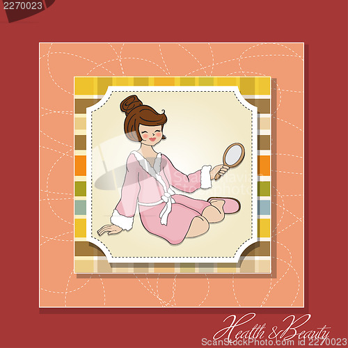 Image of spa lady who looks into a mirror
