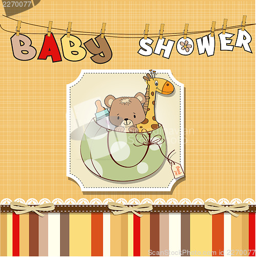 Image of new baby announcement card with bag and same toys
