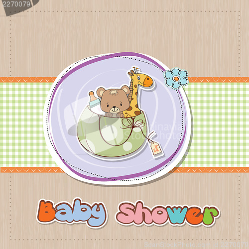 Image of new baby announcement card with bag and same toys