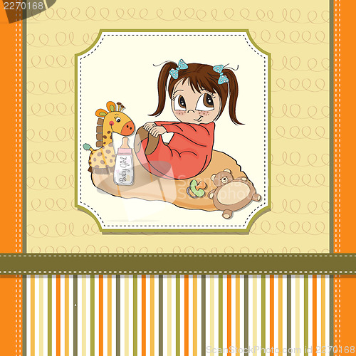 Image of little baby girl play with her toys