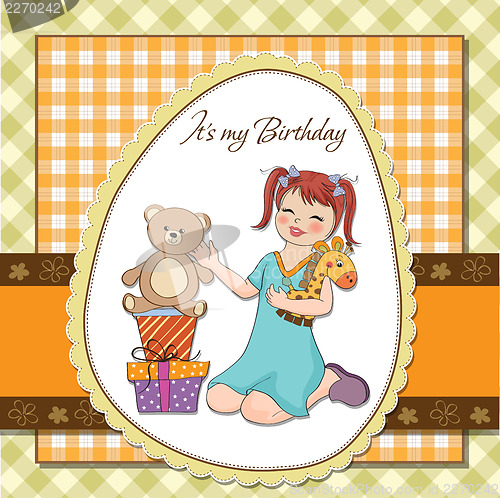 Image of little girl playing with her birthday gifts . happy birthday car
