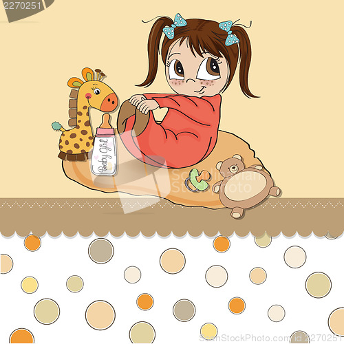 Image of little baby girl play with her toys