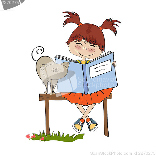 Image of young sweet girl reading a book