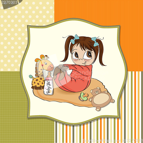 Image of little baby girl play with her toys