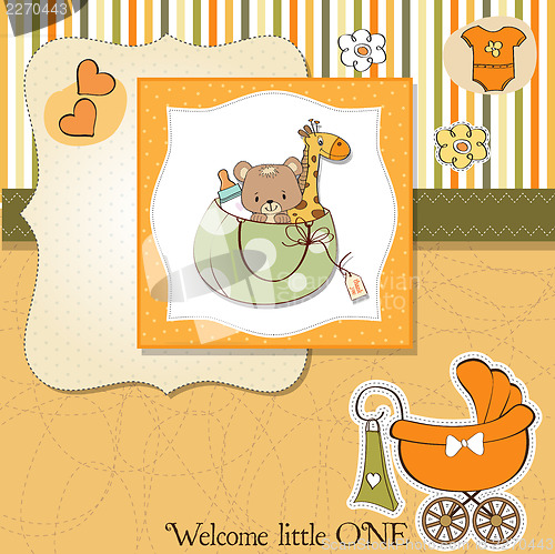 Image of new baby announcement card with bag and same toys