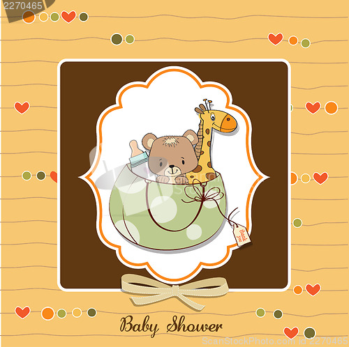 Image of new baby announcement card with bag and same toys