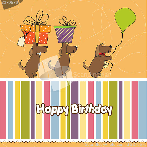 Image of three dogs that offer a big gift. birthday greeting card