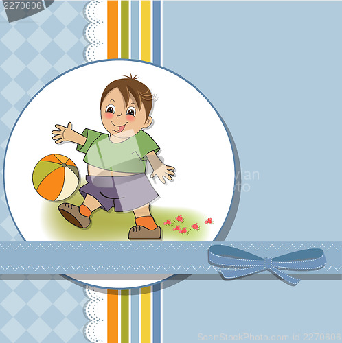 Image of little boy playing ball