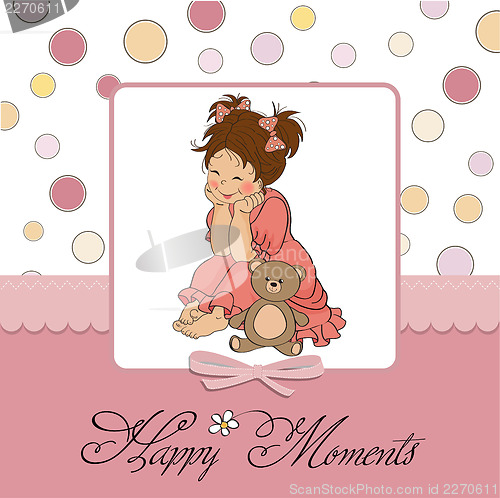 Image of little baby girl play with her teddy bear toy