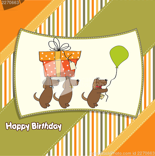 Image of three dogs that offer a big gift. birthday greeting card