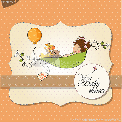 Image of little girl siting in a pea been. baby announcement card