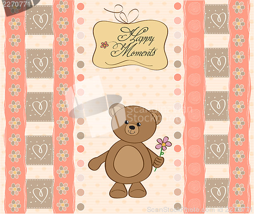Image of greetings card with teddy bear toy
