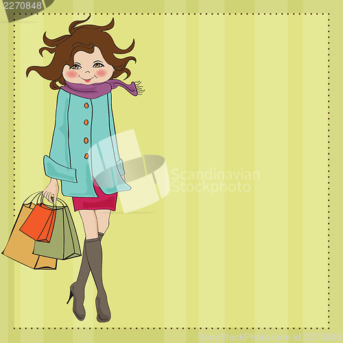 Image of beautiful young woman at shopping