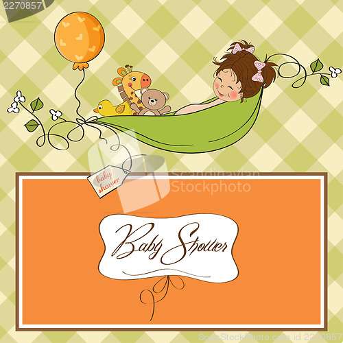 Image of little girl siting in a pea been. baby announcement card