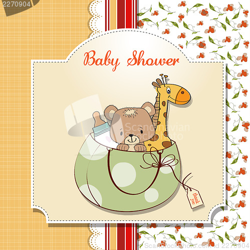 Image of new baby announcement card with bag and same toys