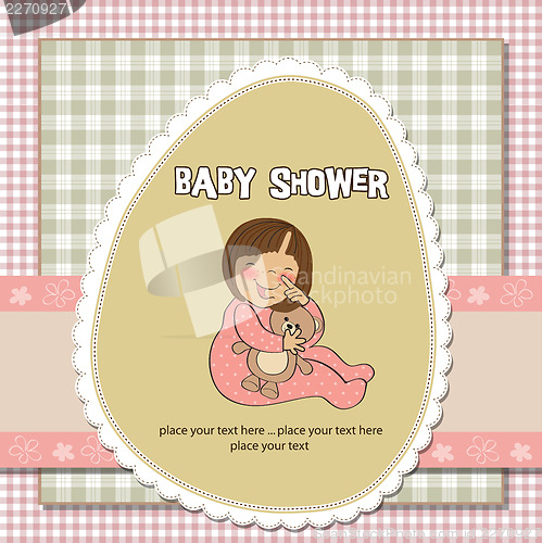 Image of little baby girl play with her teddy bear toy