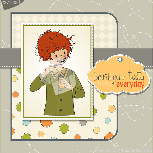 Image of A boy brushing his teeth