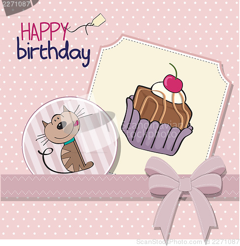 Image of birthday greeting card with a cat waiting to eat a cake