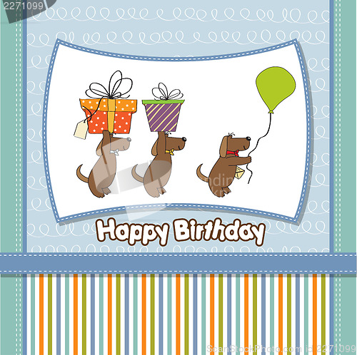 Image of three dogs that offer a big gift. birthday greeting card