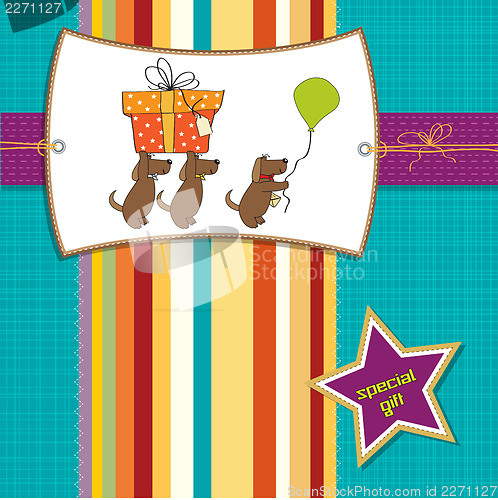 Image of three dogs that offer a big gift. birthday greeting card