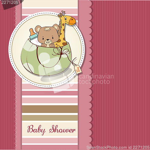 Image of new baby announcement card with bag and same toys