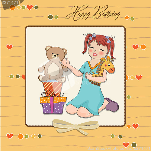 Image of little girl playing with her birthday gifts . happy birthday car