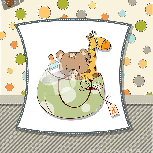 Image of new baby announcement card with bag and same toys