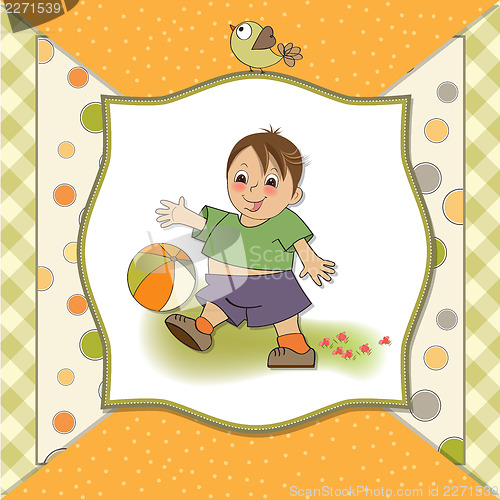 Image of little boy playing ball