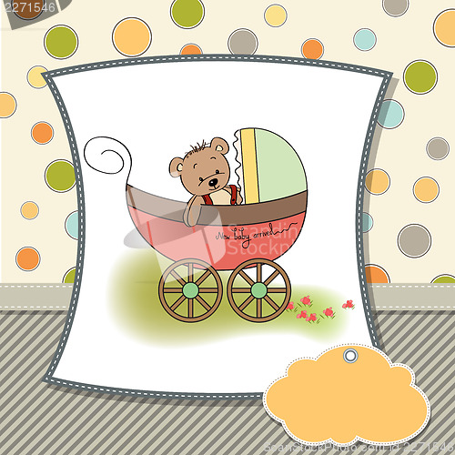 Image of funny teddy bear in stroller