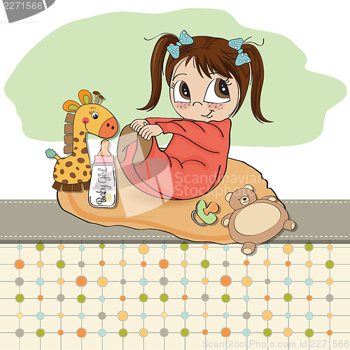 Image of little baby girl play with her toys