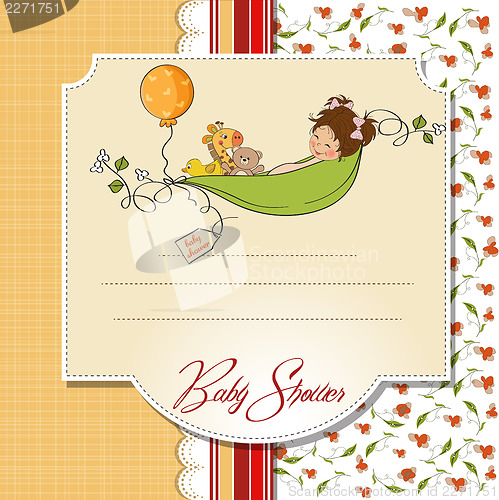 Image of little girl siting in a pea been. baby announcement card