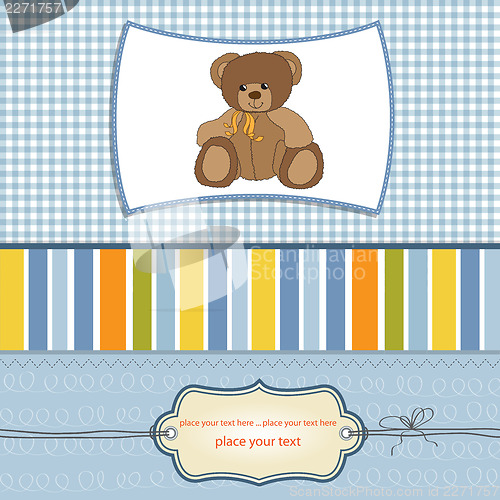 Image of new baby announcement card with teddy bear
