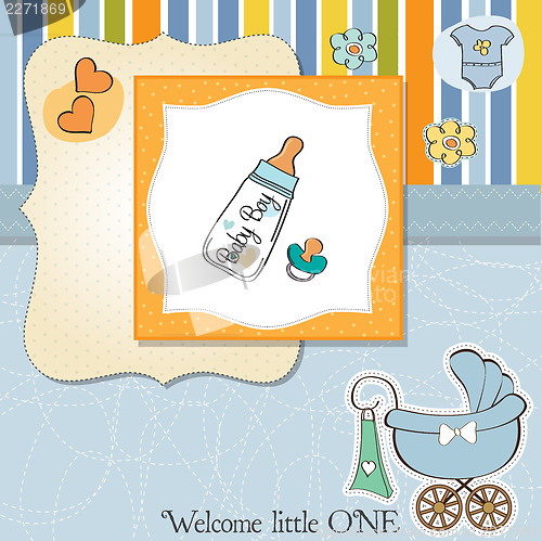 Image of baby announcement card with milk bottle and pacifier