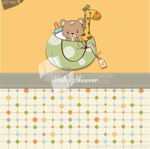Image of new baby announcement card with bag and same toys