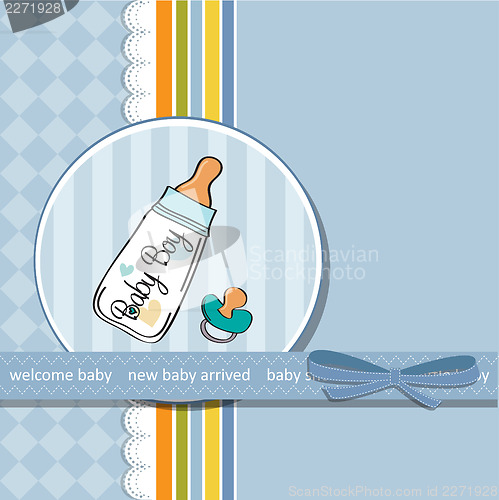 Image of baby announcement card with milk bottle and pacifier