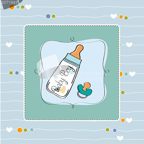 Image of baby announcement card with milk bottle and pacifier