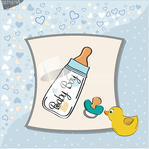 Image of baby announcement card with milk bottle and pacifier