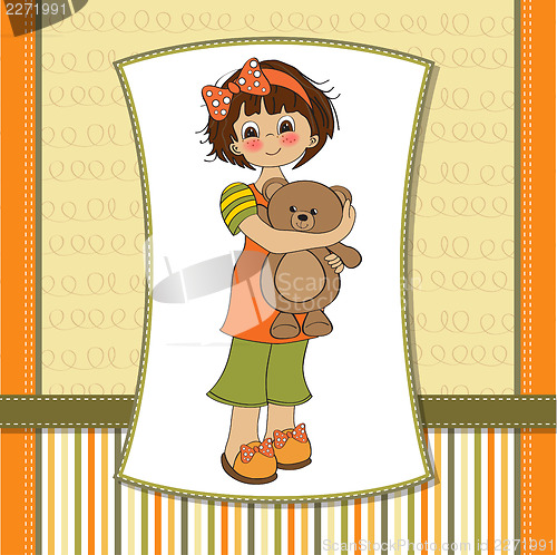 Image of young girl going to sleep with her favorite toy, a teddy bear