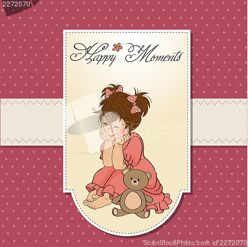 Image of little baby girl play with her teddy bear toy