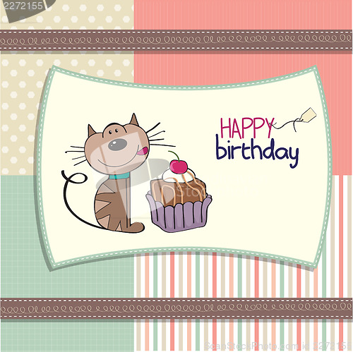 Image of birthday greeting card with a cat waiting to eat a cake